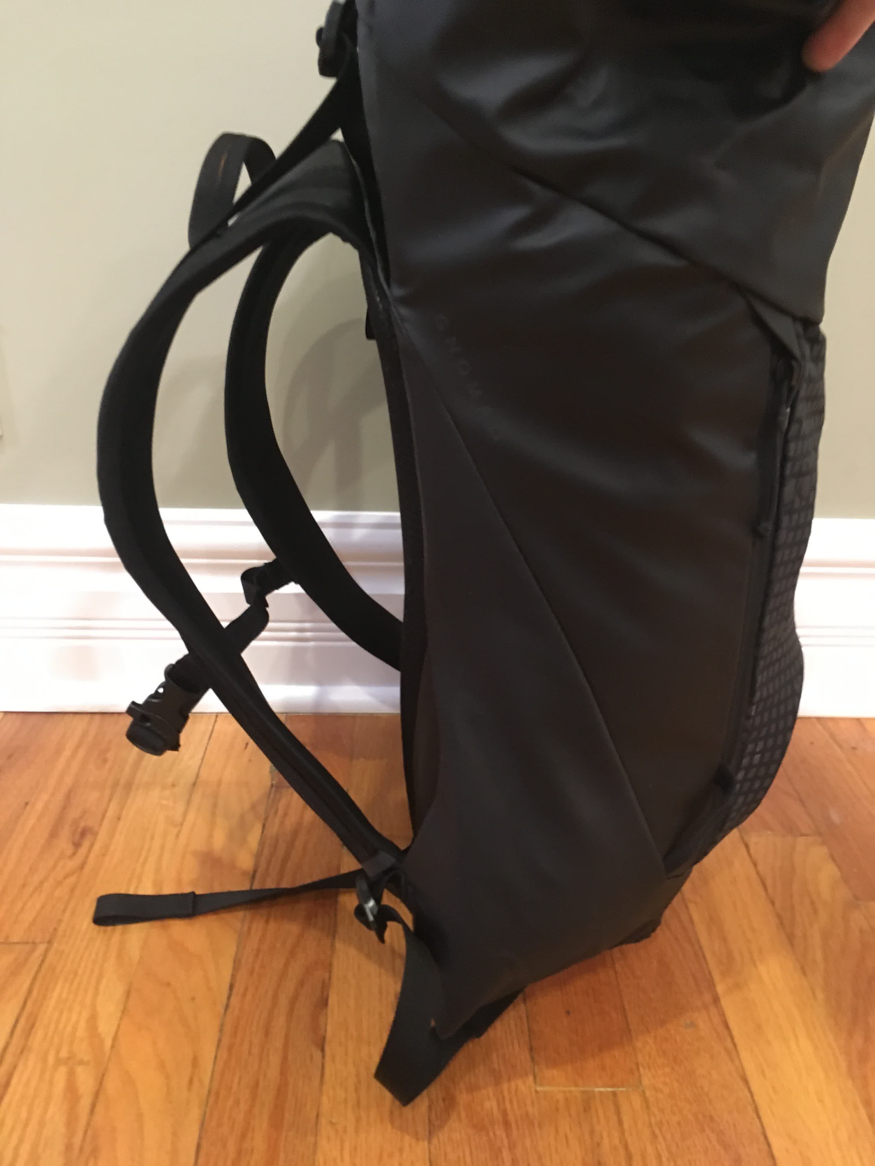 Backpack curves and keeps its shape along the backing