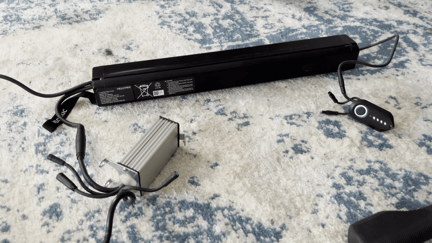 Battery, top tube module, motor controller, all removed from the Velotric